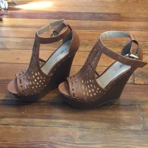 Slightly worn, well kept Just Fab wedges.